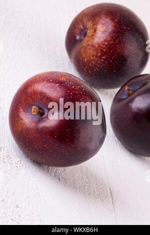 Fresh ripe red plums Stock Photo