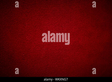 dark red cowhide suede texture with vignette, full frame, close up Stock Photo