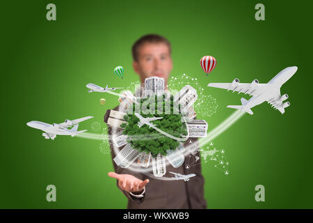 Businessman holding earth with buildings. Business concept Stock Photo