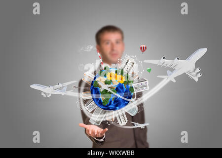 Businessman holding earth with buildings. Element of this image furnished by NASA Stock Photo