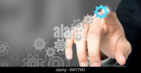 Businessman pressing an imaginary button Stock Photo