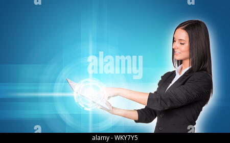 Beautiful businesswomen in suit using digital tablet. Technology concept Stock Photo