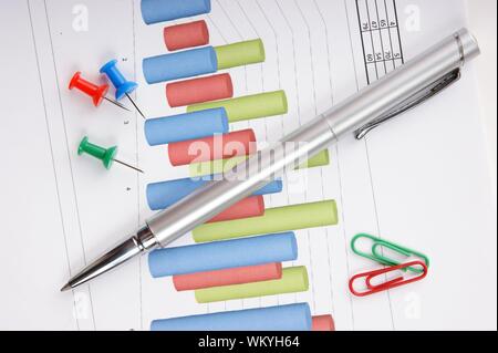 Graphs tables and documents laid on the table Stock Photo