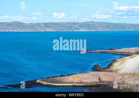 The shore of the Barents Sea (The Arctic ocean), view from the cliff . Near Teriberka, Murmansk, Russia. Stock Photo