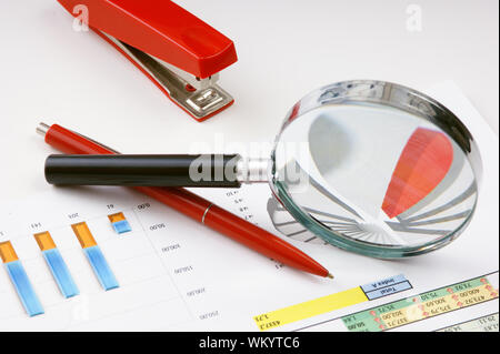 Graphs tables and documents laid on the table Stock Photo