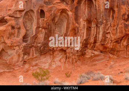 Weathered red rock formations in Atlatl Rock campground, Valley of Fire State Park, Nevada, USA Stock Photo