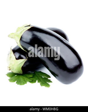 Two Ripe Raw Eggplants with Leafs isolated on white background Stock Photo