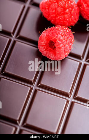 dark chocolate bar with raspberry Stock Photo