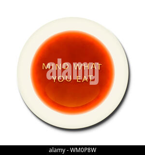 An alphabet soup with the words mind what you eat Stock Photo