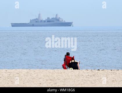 Norfolk, Virginia, USA. 04 September 2019. The Royal Netherlands Navy guided-missile frigate HNLMS De Ruyter departs Naval Station Norfolk ahead of Hurricane Dorian, which is forecasted to bring high winds and heavy rains to the region September 4, 2019 in Norfolk, Virginia. All ships at the massive Navy base are heading out to sea where they are safer from the approaching storm. Credit: Spencer R. Layne/U.S. Navy/Alamy Live News Stock Photo