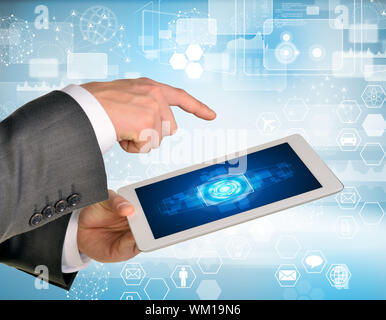 Man hands using tablet pc. Image of business elements on tablet screen Stock Photo