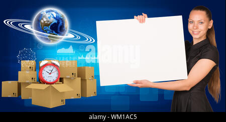 Businesswoman hold paper sheet. Earth and heap of cardboard boxes with alarm clock as backdrop. Element of this image furnished by NASA Stock Photo