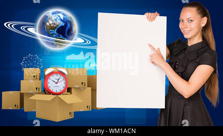 Businesswoman hold paper sheet. Earth and heap of cardboard boxes with alarm clock as backdrop. Element of this image furnished by NASA Stock Photo