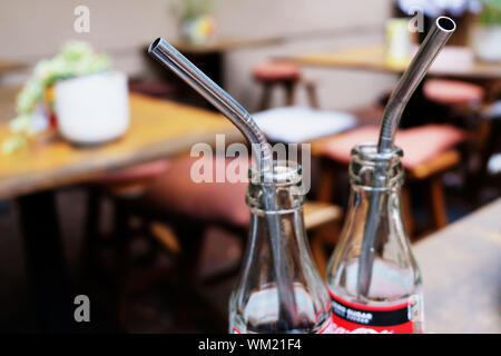 Plastic free world ecology concept. Metal straws in a restaurant or a bar. Zero Waste. Stock Photo