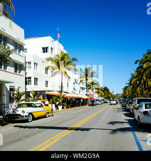 MIAMI BEACH -JANUARY 22. Vintage Car Parked along Ocean Drive in the Famous Art Deco District in South Beach. South Beach, FL, JANUARY 22, 2014. Stock Photo