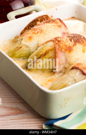 chicory baked with bacon and cheese Stock Photo
