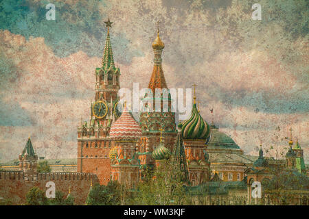 Textured vintage card of Spasskaya Tower and the cupolas of Saint Basil's cathedral in Moscow (toned image with added texture) Stock Photo