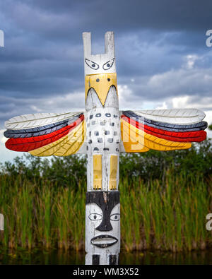 A painted totem pole by the side of the road in Big Cypress National Preserve. Stock Photo
