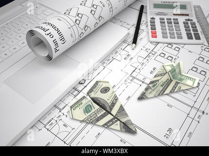 Paper airplanes of dollars lying on architectural drawings. Laptop and tools are close by. Concept of building business Stock Photo