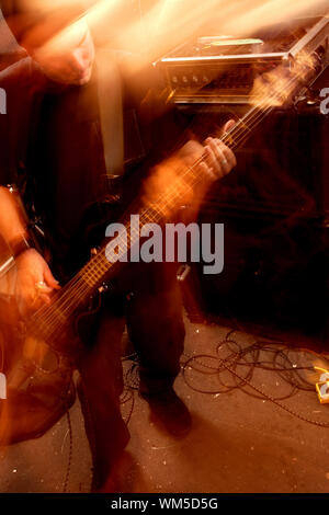 Bass player movement Stock Photo