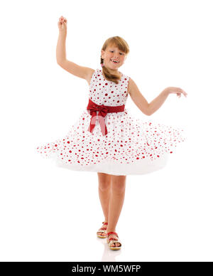 Cheerful girl spinning on floor isolated on white Stock Photo