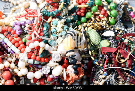 Multicolour beads in plastic in a close up abstract view with many colours and patterns Stock Photo