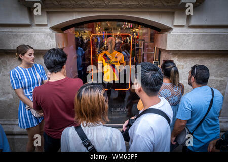 Barcelona, Spain. 04th Sep, 2019. Several people observe the new showcase at the club store.The FC Barcelona football club opens a new store in the heart of the Ramblas of Barcelona. Located at number 124, it has 1,900m2 and is the fifth store managed 100% by the FC Barcelona. Interior design has been done by designer and design theorist Juli Capella. Credit: SOPA Images Limited/Alamy Live News Stock Photo