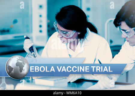 Digital composite of Ebola news flash with medical imagery Stock Photo