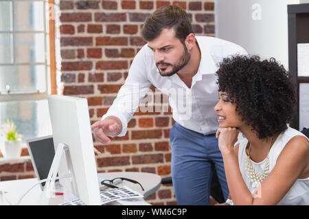 Two photo editors using computer in the office Stock Photo