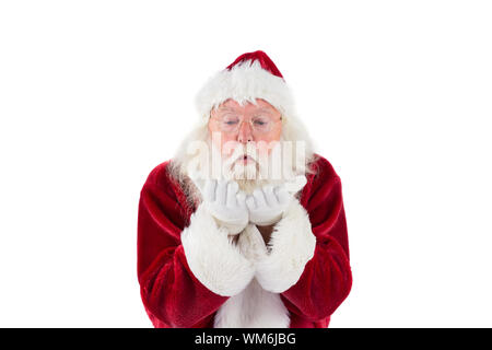 Santa Claus blows something away on white background Stock Photo