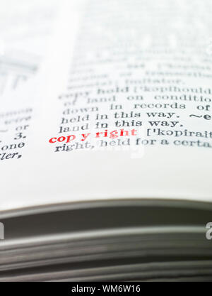 The word 'copyright' highlighted in a dictionary Stock Photo