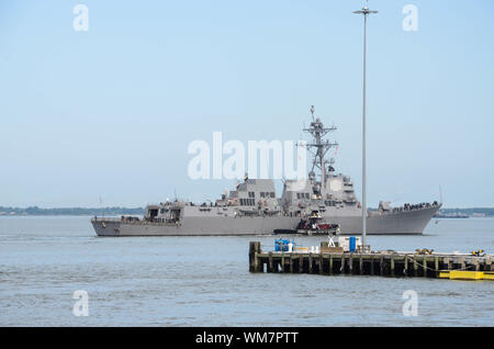 NORFOLK, Va. (Sept. 4, 2019) USS Truxtun (DDG-103) leaves Naval Station Norfolk in preparation of hurricane Dorian. This departure follows the announcement of Sortie Condition Alpha by Commander, U.S. 2nd Fleet. Stock Photo