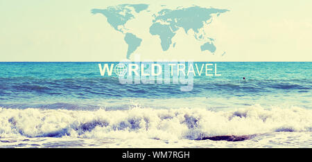 Seascape with wave rolling ashore, inscription World Travel, related symbol and contoured map of world continents Stock Photo