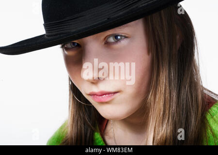 studio portrait of a pretty, eleven years old girl Stock Photo