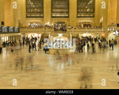 People finding their way through the Gran Central Station in NYC. Stock Photo