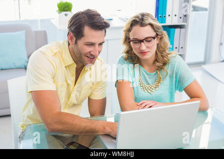 Photo editors working on computer in office Stock Photo