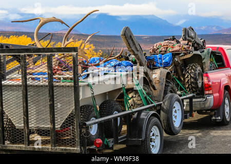 Huntsmen pick up truck on the way back with equipment and trophies, Richardson Highway, Alaska Stock Photo