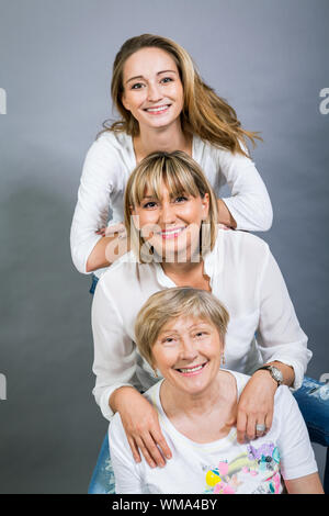 Three generations with a striking resemblance Stock Photo