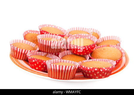 Plate with many red cup cakes isolated over white Stock Photo