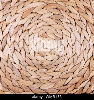 Handmade Wicker placemat made from water hyacinth. Stock Photo