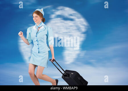 Pretty air hostess pulling suitcase against digitally generated globe in sky Stock Photo