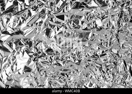 crumpled-silver-foil-shining-texture-background-bright-shiny-festive-design-metallic-glitter-surface-holiday-decorative-backdrop-143773797  - University Art