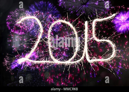 Sparky 2015 against colourful fireworks exploding on black background Stock Photo