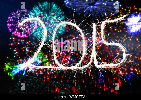 Sparky 2015 against colourful fireworks exploding on black background Stock Photo