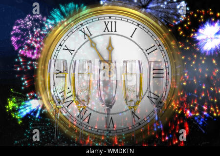 Clock counting down to midnight against three full glasses of champagne Stock Photo