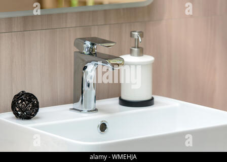Interior of modern Bathroom with white Sink and Faucet, close-up Sink Stock Photo