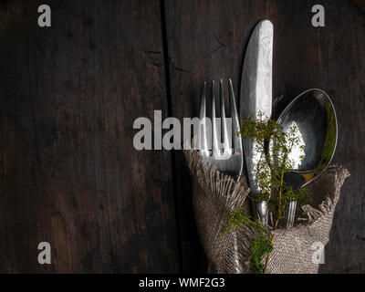 Cutlery on Rustic Old Wooden Table. Wedding. Banquet. Stock Photo