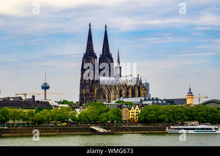 The Cologne Cathedral from the other side of the Rhine with TV Tower in the background in Cologne Germany Stock Photo