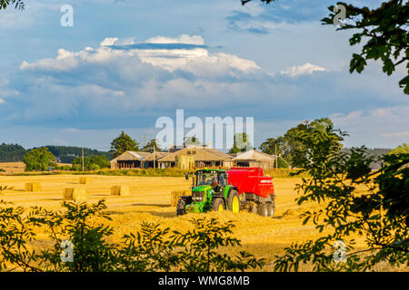 Harvesting Barley near  Portsoy in Aberdeenshire Scotland