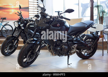 Russia, Izhevsk - August 23, 2019: Yamaha motorcycle shop. New motorbikes and accessories in motorcycle store. Famous world brand. Stock Photo